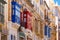 Traditional colorful wooden balconies, Malta