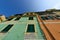 Traditional colors of the house, walls, doors, windows. Italy