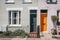 Traditional colourful bright doors on houses in Barnes, London,