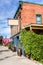 Traditional Commercial Brick Building under Blue Sky With Clouds