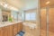 Traditional contemporary master bathroom interior with window