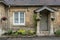 Traditional cotswold stone cottages built of distinctive yellow limestone in the lovely village of Bibury, Gloucestershire England