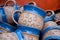 Traditional crafts - decorated blue brown ceramic mugs