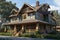 traditional craftsman house with wrap-around porch and shingled exterior