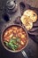 Traditional Creole cajun court bouillon with fish and seafood gumbo chowder stew in a rustic casserole