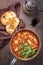 Traditional Creole cajun court bouillon with fish and seafood gumbo chowder stew in a rustic casserole