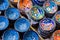 Traditional Cretan painted ceramic dishes for sale at a city centre shop Crete, Greece, Europe.