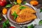 Traditional Crimean Tatar cuisine, chebureki with chicken meat. Fried empanadas on wooden background