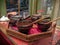 Traditional cute and cozy zen like set for tea drinking, wooden pot, cups and spoons on a plate, calming atmosphere with healthy