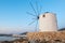 Traditional cycladic windmill at sunset on Paros island, Cyclade