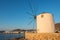 Traditional cycladic windmill at sunset on Paros island, Cyclades