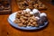 Traditional Czech Christmas sweets, tea cookie, sweet balls and gingerbread on plate on wooden table