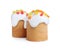 Traditional decorated Easter cakes on white background