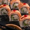 Traditional delicious fresh baked Philadelphia sushi roll set on a black background. Japanese oriental cuisine