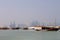 Traditional dhows moored up along the corniche in the Qatari capital Doha, with the skyscrapers