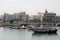 Traditional dhows moored up by Doha corniche