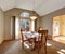 Traditional dinning room with carpet, in beautiful northwest home.