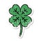 traditional distressed sticker tattoo of a 4 leaf clover