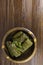 Traditional dolma in grape leaves on wooden table