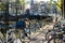 Traditional dutch bicycles parked on the bridge in Amsterdam, th