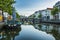 Traditional Dutch culture houses and canal during dusk in Leiden, Holland