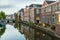 Traditional Dutch culture houses and canal during dusk in Leiden, Holland