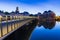 Traditional Dutch culture houses and canal during dusk in Leiden, Holland