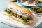 Traditional dutch snack, seafood sandwich with herring