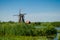 Traditional dutch windmill in famous Kinderdijk, The Netherlands