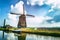 Traditional dutch windmill near the canal