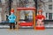 Traditional Dymkovo toy Man and Woman as art object and swing at Russian national festival `Shrove` in Tverskoy Boulevard in Mosco