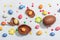 Traditional Easter sweets with eggs, chocolate rabbit, festive edible decor. Children\\\'s quest