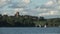 Traditional England with church lake and small sailing boats