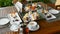 Traditional English afternoon tea stand with selection of sweets - cakes, snacks