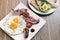 Traditional english british fried breakfast with eggs bacon and