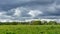 Traditional English countryside under gloomy threatening clouds, Cheshire, UK