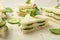 Traditional English cucumber sandwiches on parchment