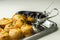 Traditional  English pork pies with cranberry sauce on a silver tray