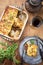 Traditional English shepherds pie on a pewter plate and backing dish