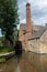 Traditional English Watermill by stream