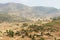 Traditional Ethiopian wooden village houses with straw roofs in the valley near Gondar, Ethiopia.