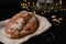 Traditional European Christmas pastry, fragrant home baked stollen, with spices and dried fruit.