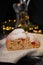 Traditional European Christmas pastry, fragrant home baked stollen, with spices and dried fruit.