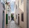 Traditional European Mediterranean architectural style in the streets and houses, yard, porches, stairs, shutters in the afternoon