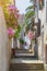 Traditional European Mediterranean architectural style in the streets and houses, yard, porches, stairs, shutters in the afternoon