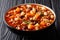 Traditional fagioli soup with vegetables, ditalini pasta and ground beef closeup in a bowl. horizontal