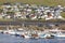Traditional faroese village with harbor beach and houses. Sorvagur