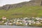 Traditional faroese village in Suduroy island. Fjord landscape. Tvoroyri
