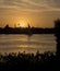 Traditional felluca sailing boat silhouette at sunset