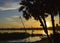 Traditional felluca sailing boat silhouette at sunset